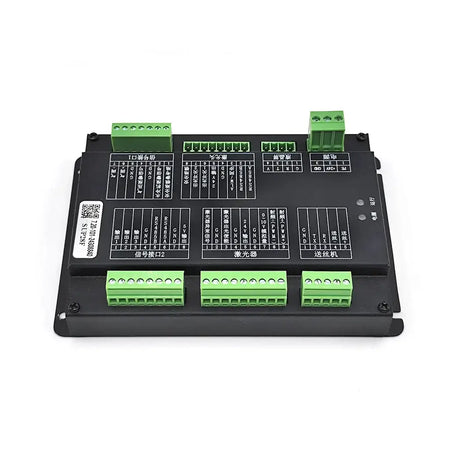 Industrial laser welding equipment control module with green and black connectors.