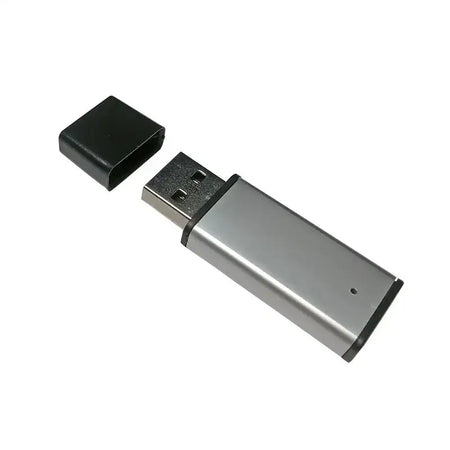 Open silver USB flash drive with detached black cap on white background.